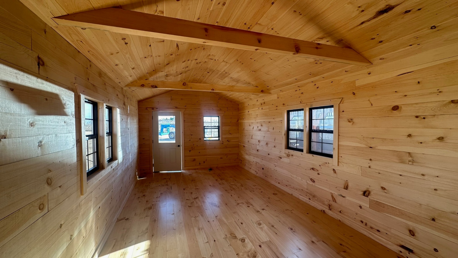 Pine cabin interior facing the front door